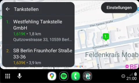 Spritpreise Deutschland map view on Android Auto, with station pins labelled by price