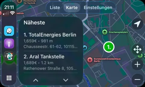 Spritpreise Deutschland map view on Apple CarPlay, with station pins labelled by price